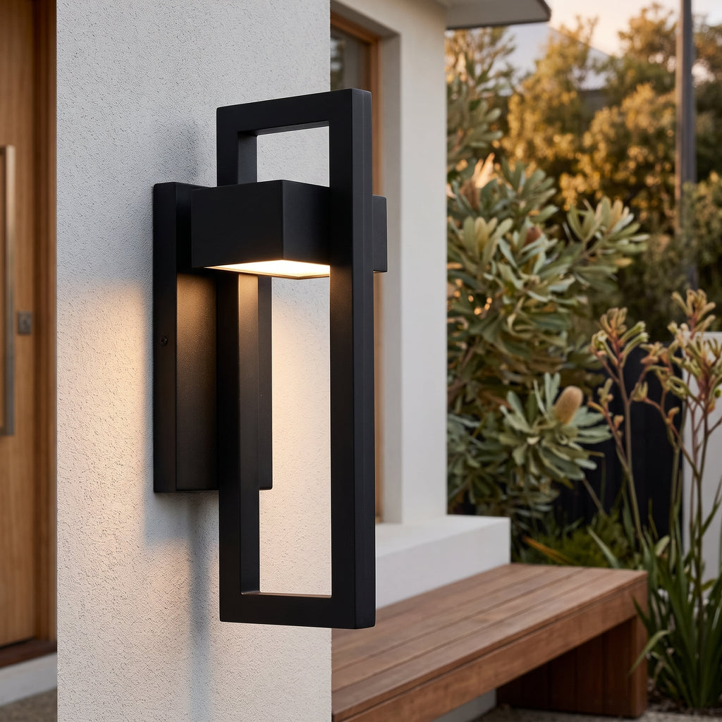 Black Up Down Outdoor Wall Light illuminating an alfresco entrance at dusk