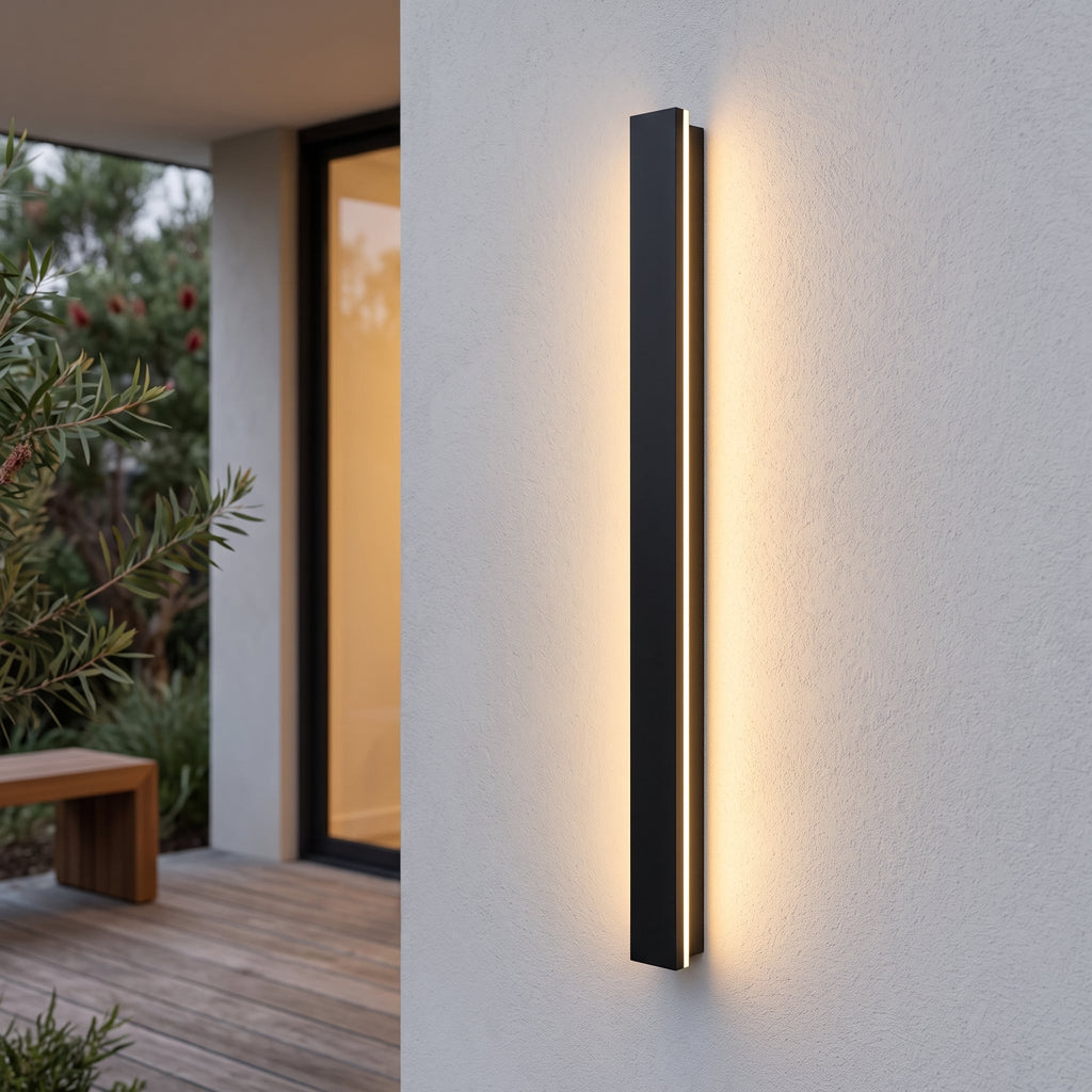 Black Linear LED Wall Light illuminating a modern alfresco entry at dusk